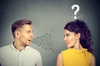 woman with aphasia after brain injury struggling to understand what others are saying